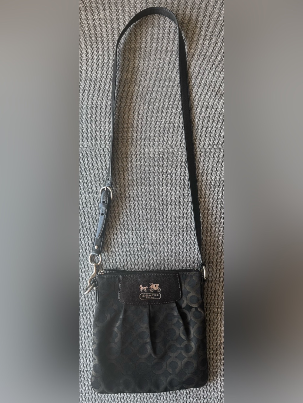 Coach Madison Op Art Signature Crossbody Bag in classic black.